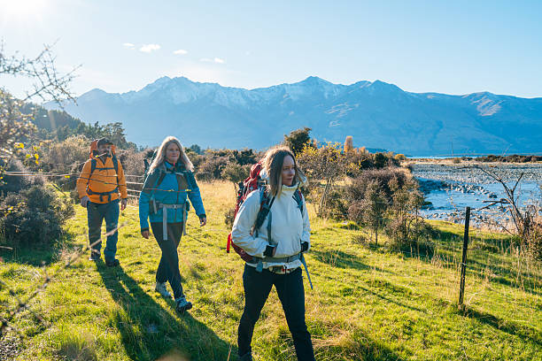 Group of people walking together outdoors in New Zealand